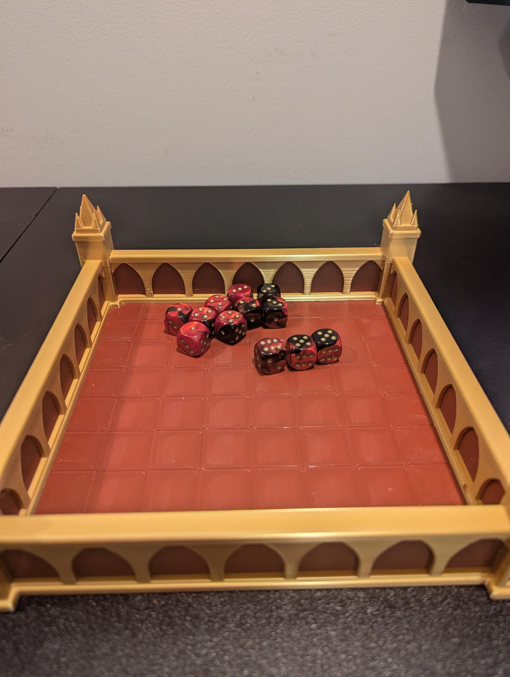 Gothic Cathedral Dice Tray from a high angle with a cluster of dice