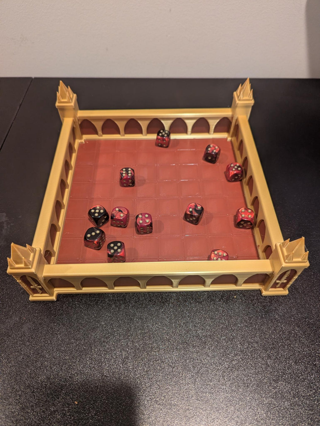 Top-down view of the tiled rolling floor with dice spread out